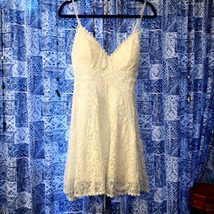 White lace v-cut mini dress
